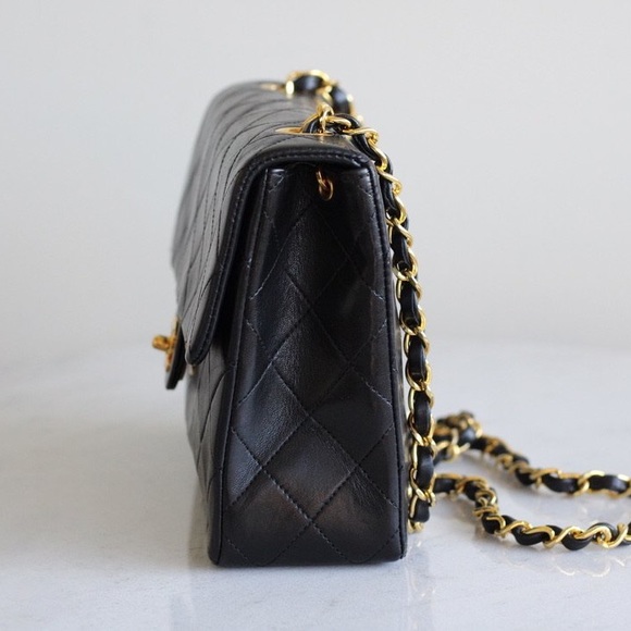 Vintage Chanel / Black Lambskin
20cm Square with 24k Gold
Hardware - Picture 4 of 14